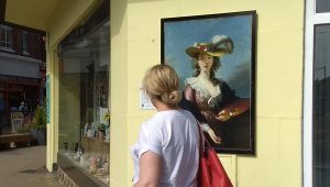 Le Brun outside upstairs downstairs