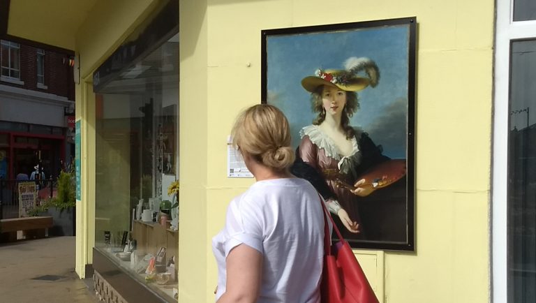 Le Brun outside upstairs downstairs